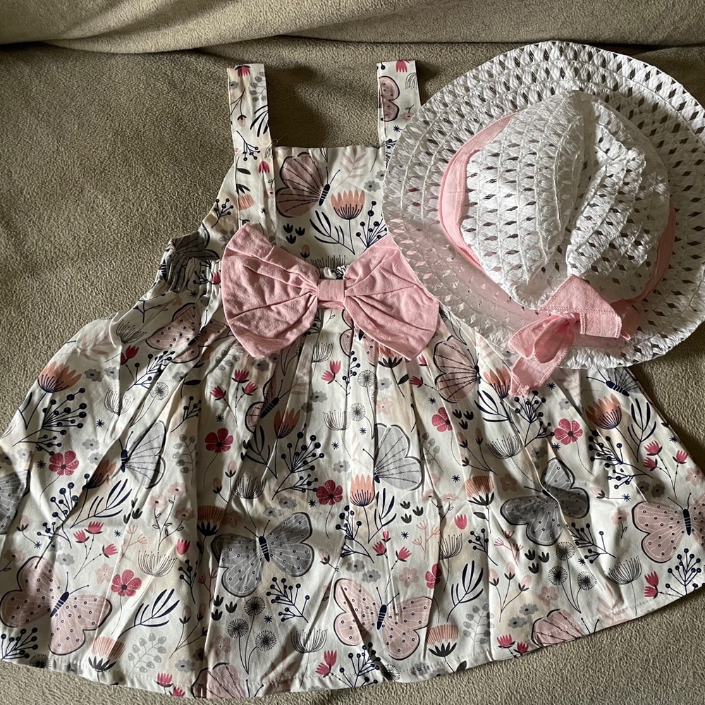 Floral dress and hat for a young baby girl
